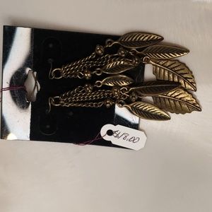 Southwestern Navaho Style Earrings with Feathers .